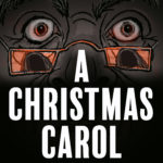 A Christmas Carol Cropped face that has two eyes and the bridge of a nose. Eyes are wide open and glasses sit on their nose. The reflection in the glasses is a spector. A Christmas Carol is written below the face.